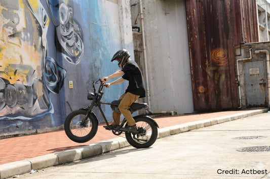 Actbest Core electric bike from the side showing step-through frame and integrated battery design.